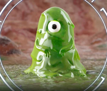 a green frog with a white face