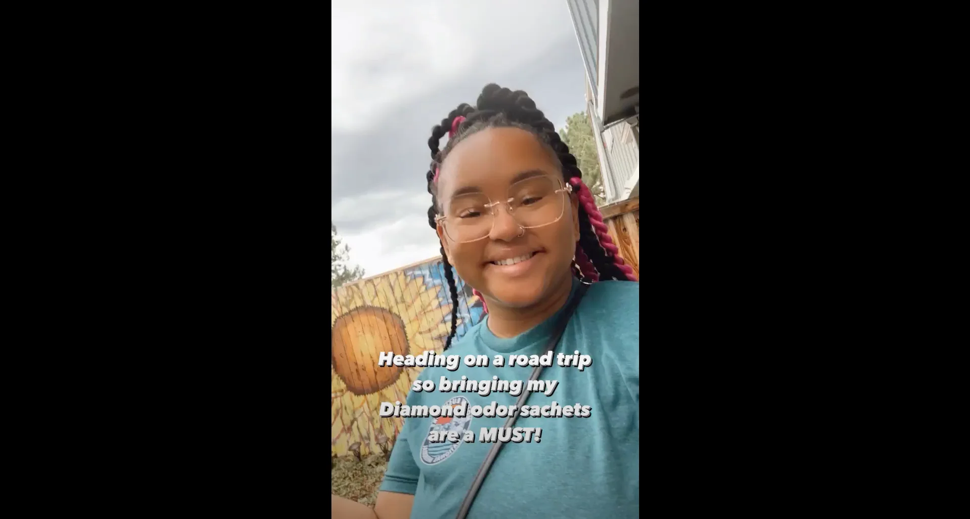 a person smiling with a basketball